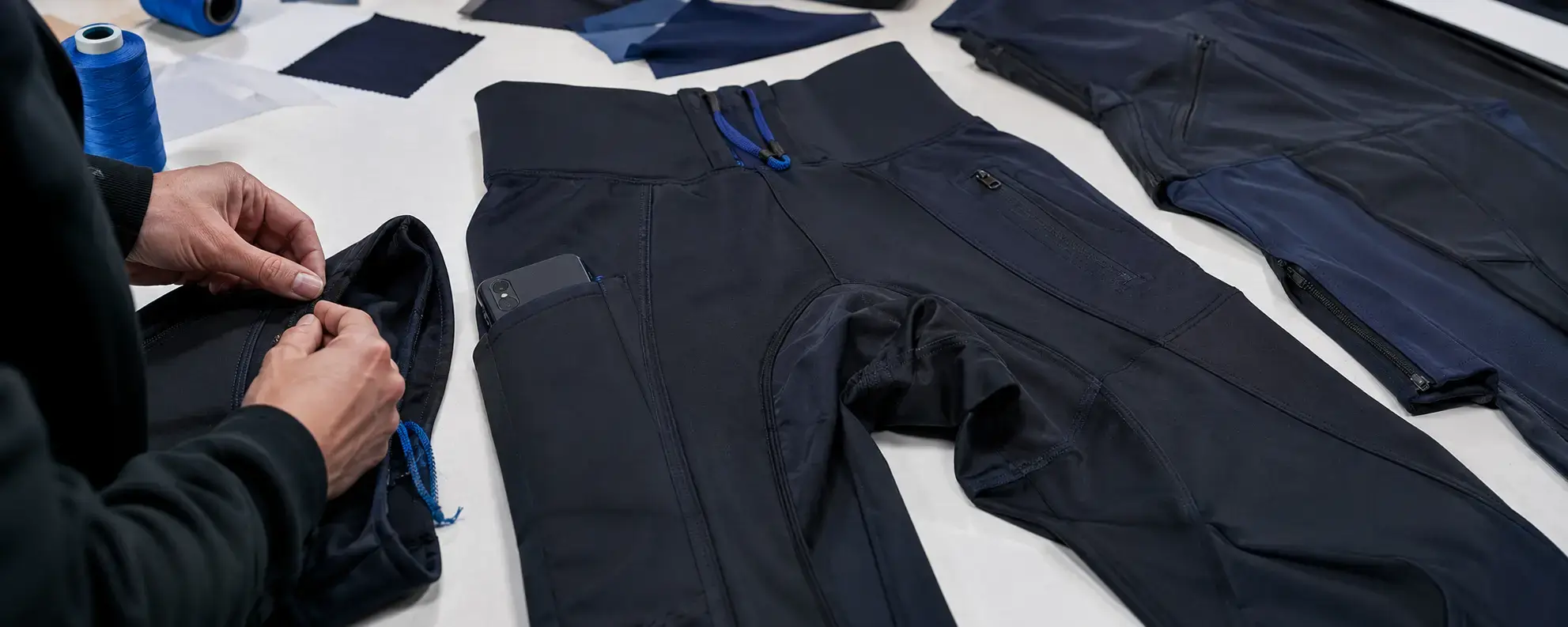 Placeholder for sports bottoms waistband pocket and construction development