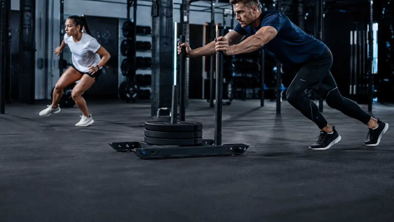 Athletes testing performance gym apparel during HIIT and conditioning movements